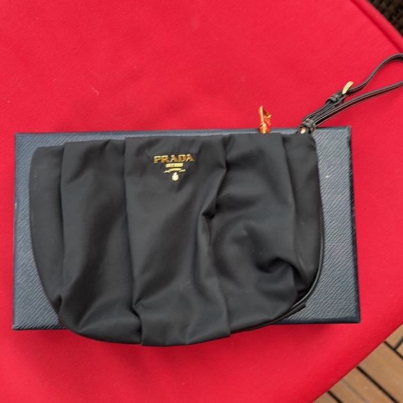 ⛔️SOLD⛔️ PRADA Black Wristlet with Gold accents. - Picture 2 of 16